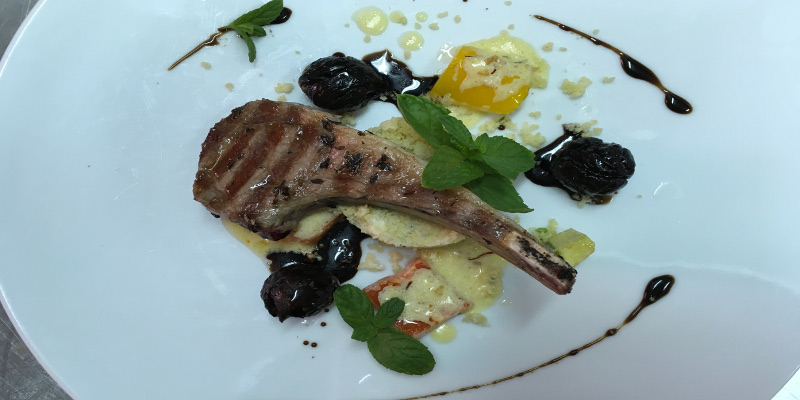 Lamb Chops with Mint Couscous, drizzled with Saffron Vegetables, served with dry Prunes Gravy